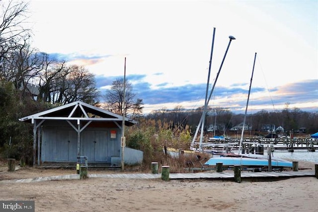 1157 Pine Tree Dr, Annapolis, MD 21409 - view of outbuilding with a water view