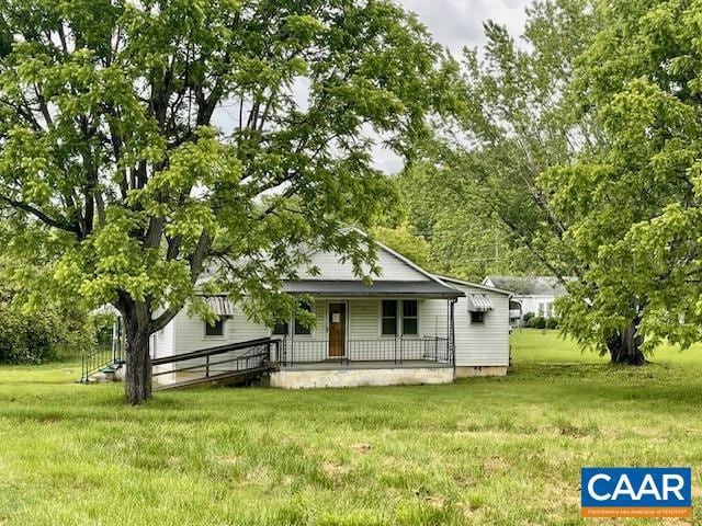 24 E 1st St, Craigsville, VA 24430 - view of front of home featuring a porch and a front lawn