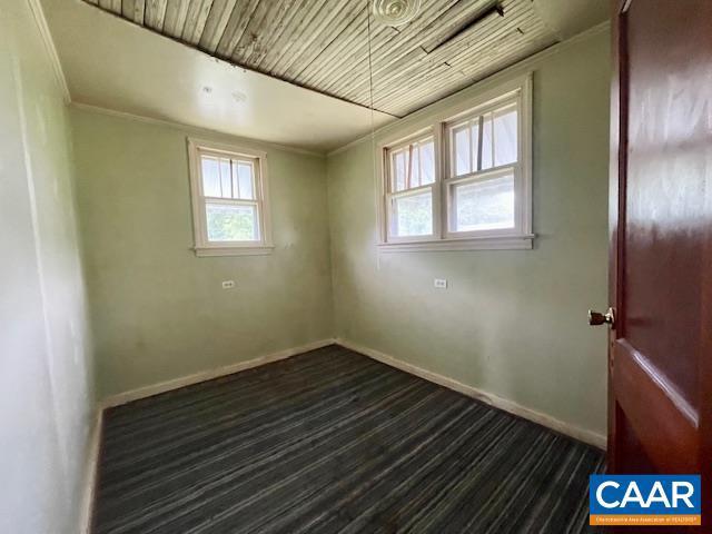 24 E 1st St, Craigsville, VA 24430 - spare room with baseboards and ornamental molding