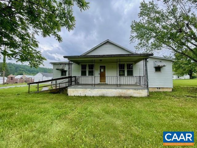 24 E 1st St, Craigsville, VA 24430 - view of front of property featuring a porch and a front lawn