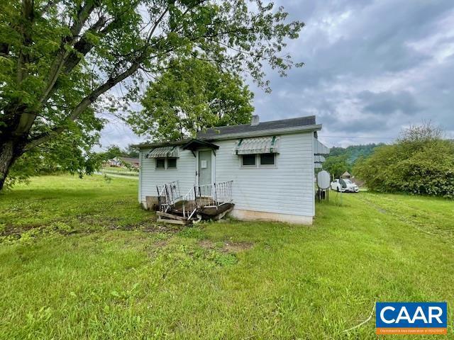24 E 1st St, Craigsville, VA 24430 - rear view of property featuring a lawn