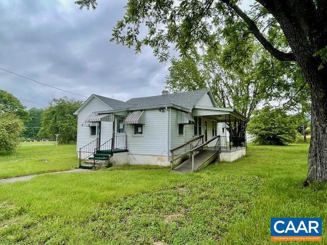24 E 1st St, Craigsville, VA 24430 - bungalow-style house featuring a front yard and roof with shingles