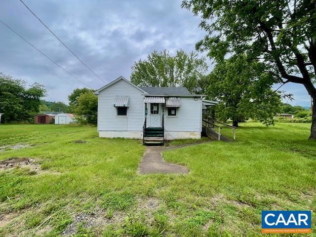 24 E 1st St, Craigsville, VA 24430 - back of house with entry steps and a yard