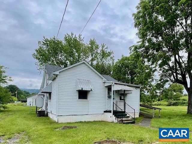 24 E 1st St, Craigsville, VA 24430 - back of house with a yard