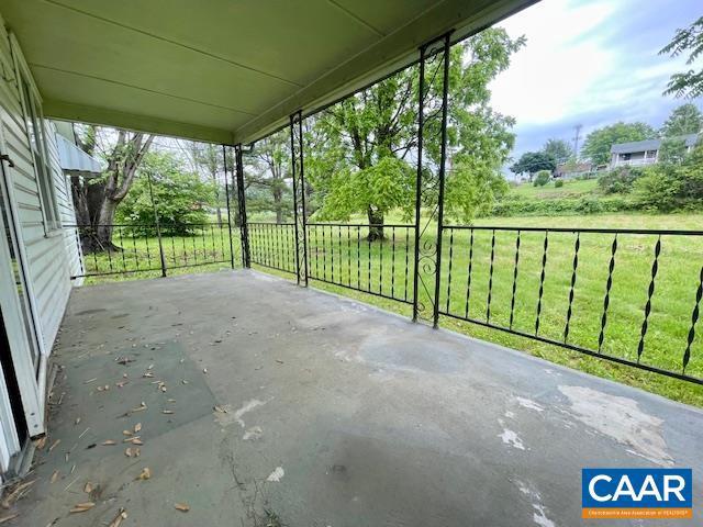 24 E 1st St, Craigsville, VA 24430 - view of patio featuring a carport and driveway