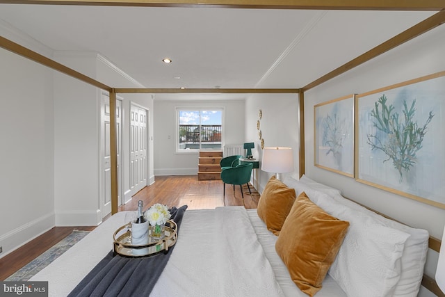 3551 13th St NW, Washington, DC 20010 - bedroom featuring wood finished floors, baseboards, recessed lighting, and ornamental molding
