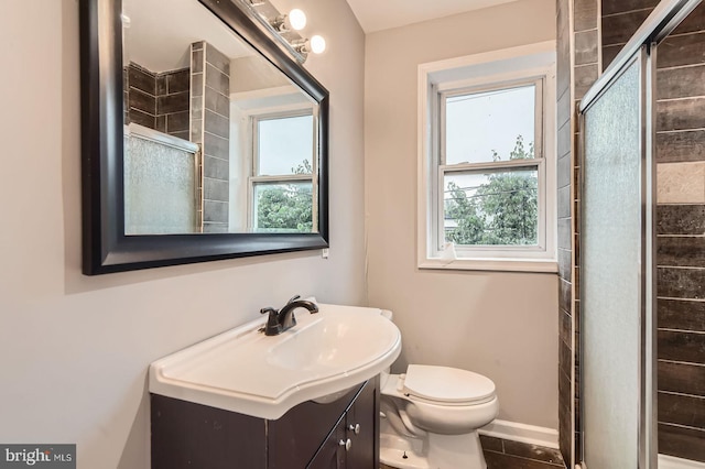 4158 Eierman Ave, Baltimore, MD 21206 - bathroom with vanity, a stall shower, toilet, tile patterned flooring, and baseboards