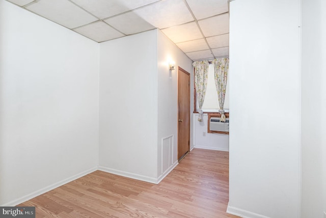 105 Ann St, Duncannon, PA 17020 - hall featuring a drop ceiling, light wood-type flooring, baseboards, and cooling unit