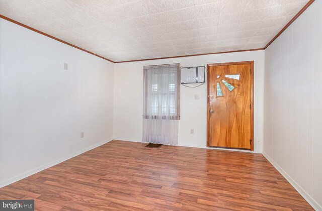 105 Ann St, Duncannon, PA 17020 - unfurnished room with ornamental molding, wood finished floors, and baseboards