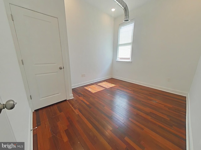 3228 W Diamond St, Philadelphia, PA 19121 - spare room with dark wood-style flooring and baseboards