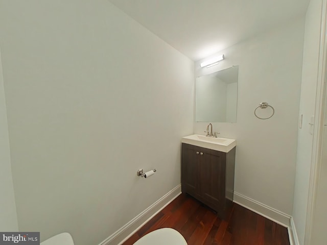3228 W Diamond St, Philadelphia, PA 19121 - half bathroom featuring vanity and wood finished floors