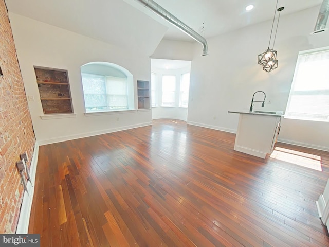 3228 W Diamond St, Philadelphia, PA 19121 - unfurnished living room featuring hardwood / wood-style flooring and a sink