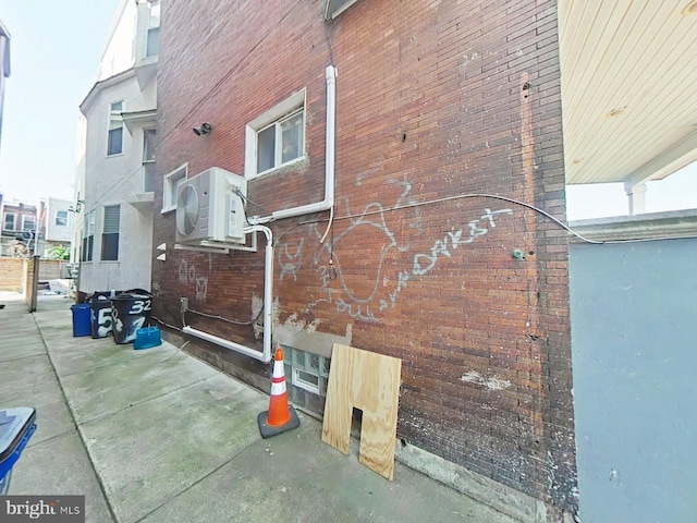 3228 W Diamond St, Philadelphia, PA 19121 - view of home's exterior featuring a cooling unit and brick siding