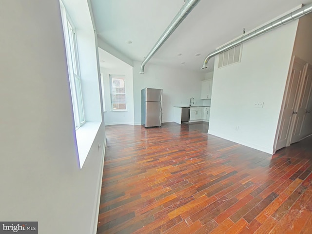 3228 W Diamond St, Philadelphia, PA 19121 - spare room featuring dark wood-type flooring