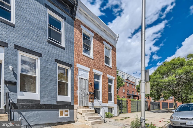 2228 W Baltimore St, Baltimore, MD 21223 - view of property exterior with brick siding and entry steps