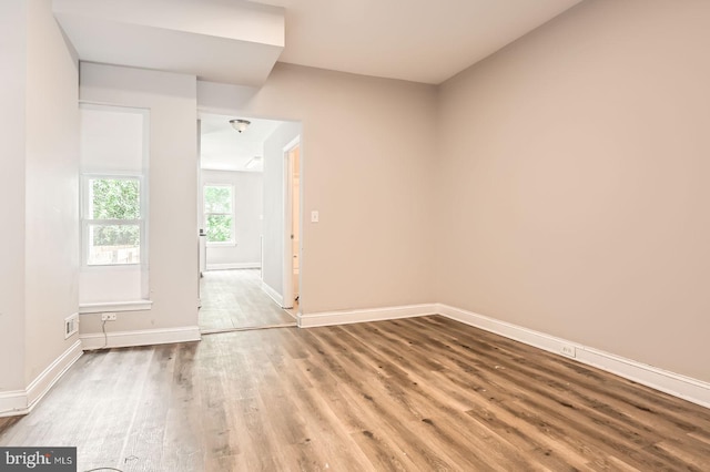2228 W Baltimore St, Baltimore, MD 21223 - unfurnished room with wood finished floors and baseboards