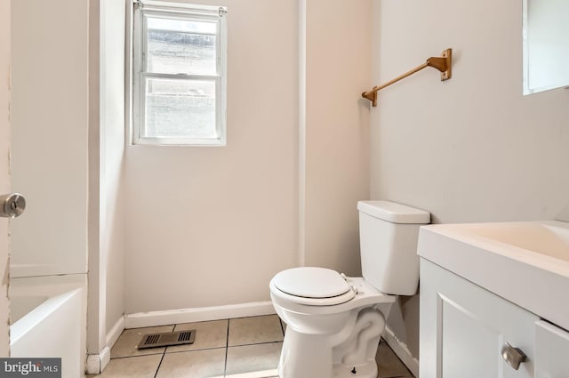 2228 W Baltimore St, Baltimore, MD 21223 - bathroom with vanity, toilet, baseboards, and tile patterned flooring