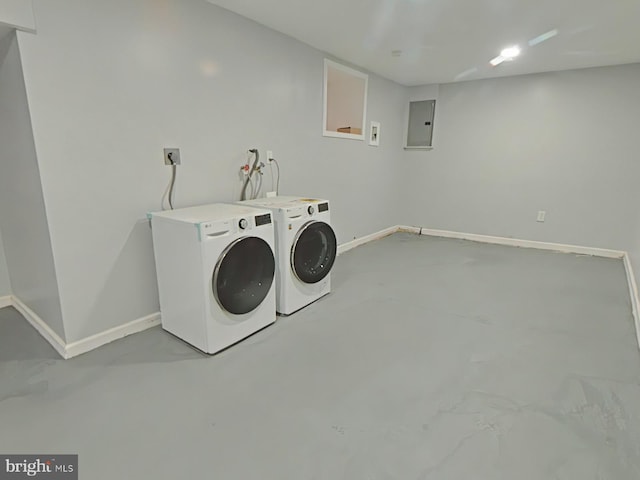 134 N Hobart St, Philadelphia, PA 19139 - laundry room with washing machine and dryer, baseboards, and electric panel