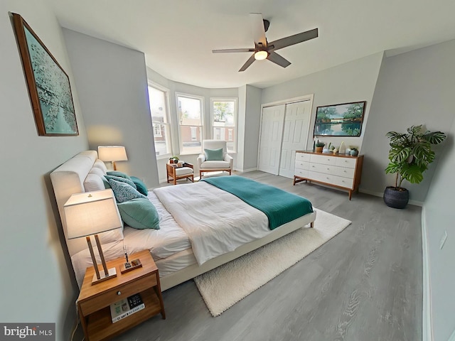 134 N Hobart St, Philadelphia, PA 19139 - bedroom with wood finished floors, a closet, baseboards, and ceiling fan