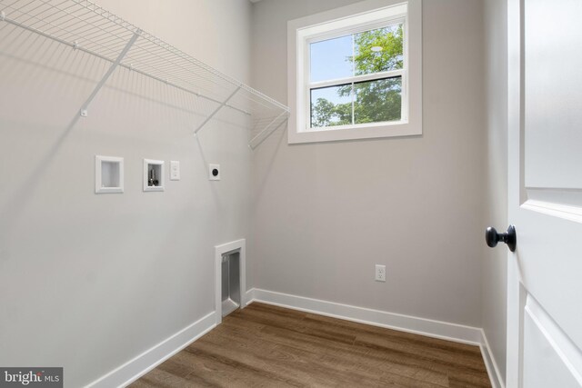 13 Connie Trl, Fairfield, PA 17320 - laundry area with electric dryer hookup, hookup for a washing machine, dark wood-type flooring, and baseboards