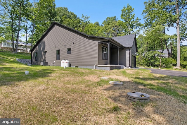 13 Connie Trl, Fairfield, PA 17320 - view of side of home with central AC, a lawn, and driveway