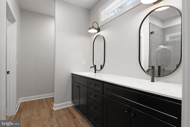 13 Connie Trl, Fairfield, PA 17320 - full bath with wood finished floors, double vanity, baseboards, and tiled shower