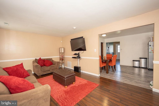 536 Cormorant Dr, Voorhees, NJ 08043 - living area featuring wood finished floors and baseboards