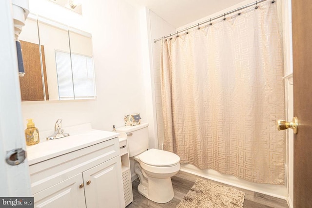 536 Cormorant Dr, Voorhees, NJ 08043 - bathroom featuring wood finished floors, toilet, vanity, and shower / bathtub combination with curtain