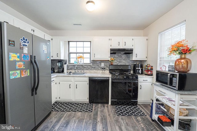 536 Cormorant Dr, Voorhees, NJ 08043 - kitchen featuring black appliances, under cabinet range hood, a sink, dark wood-style floors, and white cabinets