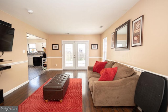 536 Cormorant Dr, Voorhees, NJ 08043 - living area featuring french doors, dark wood-style flooring, and baseboards