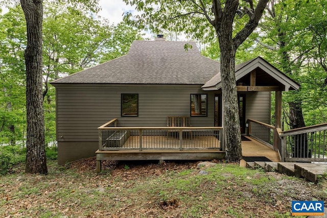 201 Pinnacle Dr, Wintergreen, VA 22967 - back of property featuring a deck, roof with shingles, and a chimney