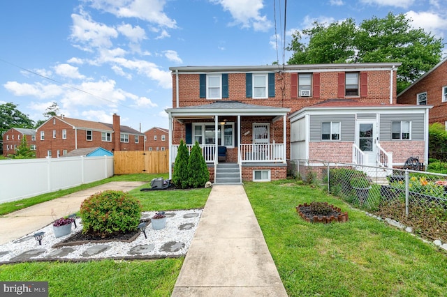 2410 Saint Clair Dr, Temple Hills, MD 20748 - view of property featuring brick siding and a porch