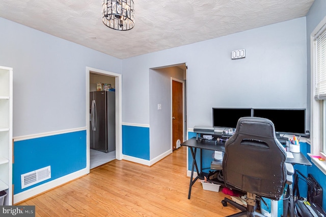 2410 Saint Clair Dr, Temple Hills, MD 20748 - office featuring wood finished floors, baseboards, and a chandelier