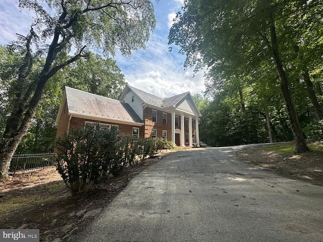 7615 Kincheloe Rd, Clifton, VA 20124 - view of property exterior with brick siding and asphalt driveway