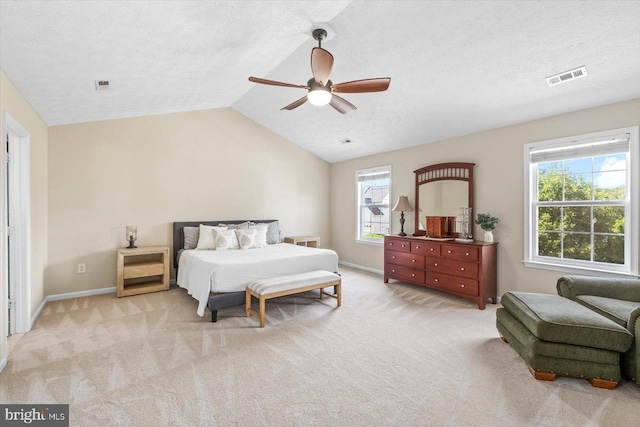 1104 Century Oak Dr, Fredericksburg, VA 22401 - bedroom featuring light carpet, lofted ceiling, ceiling fan, baseboards, and a textured ceiling