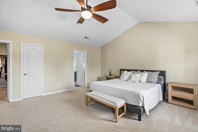 1104 Century Oak Dr, Fredericksburg, VA 22401 - bedroom featuring carpet, vaulted ceiling, baseboards, a spacious closet, and a ceiling fan