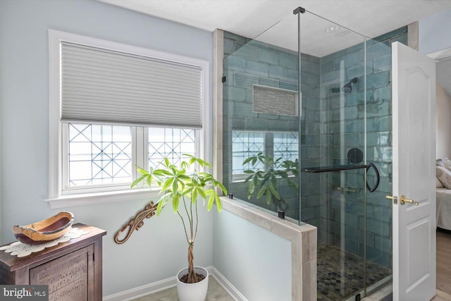1104 Century Oak Dr, Fredericksburg, VA 22401 - bathroom featuring a stall shower and baseboards