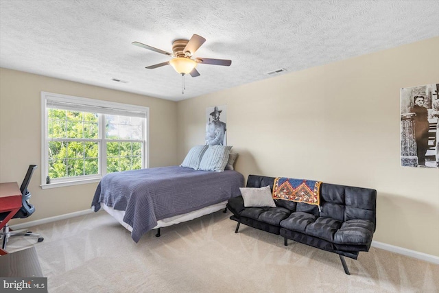 1104 Century Oak Dr, Fredericksburg, VA 22401 - bedroom featuring baseboards, carpet, a textured ceiling, and a ceiling fan