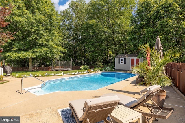 1104 Century Oak Dr, Fredericksburg, VA 22401 - view of swimming pool with a trampoline, a patio area, a fenced backyard, and view of scattered trees