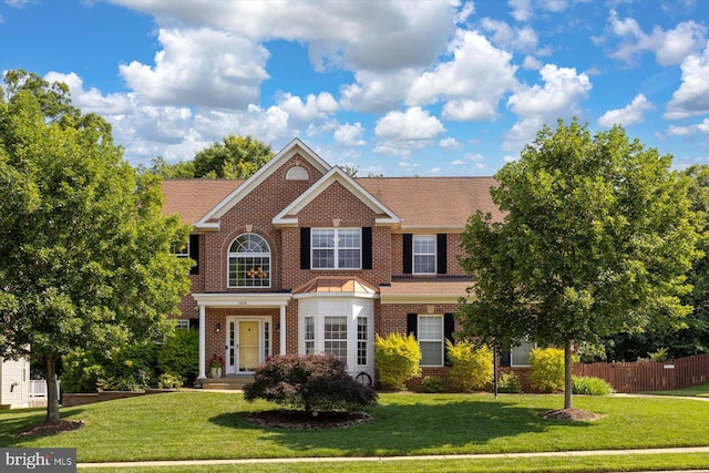 1104 Century Oak Dr, Fredericksburg, VA 22401 - colonial inspired home featuring brick siding and a shingled roof