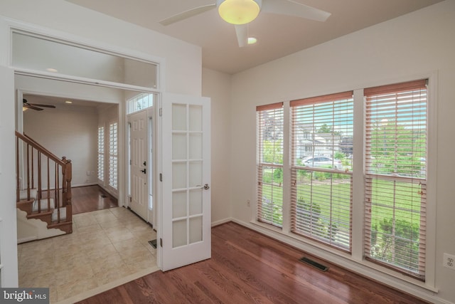 1421 Pickett Ct, Front Royal, VA 22630 - foyer with a ceiling fan, stairway, and wood finished floors