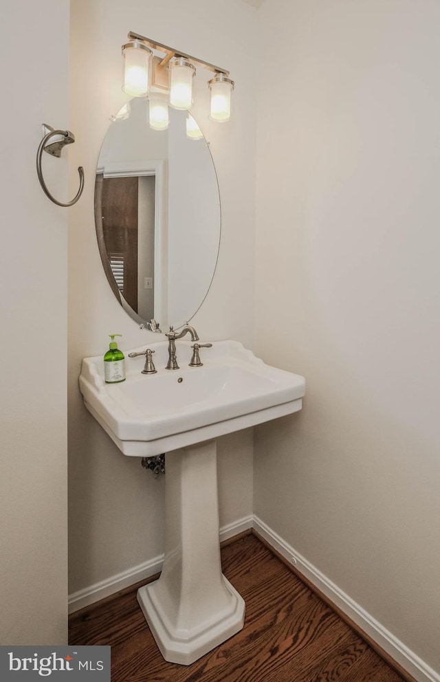1421 Pickett Ct, Front Royal, VA 22630 - bathroom featuring baseboards and wood finished floors