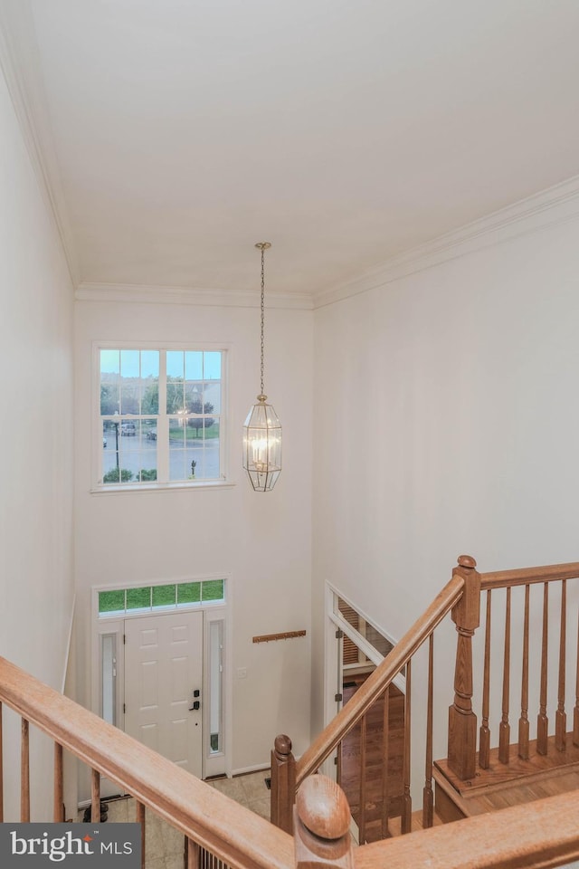 1421 Pickett Ct, Front Royal, VA 22630 - stairs with ornamental molding, a chandelier, and a water view