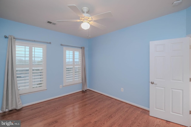 1421 Pickett Ct, Front Royal, VA 22630 - spare room featuring light wood-style floors, ceiling fan, and a smoke detector