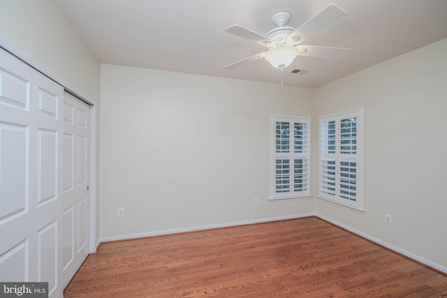 1421 Pickett Ct, Front Royal, VA 22630 - unfurnished bedroom featuring wood finished floors, a closet, and a ceiling fan
