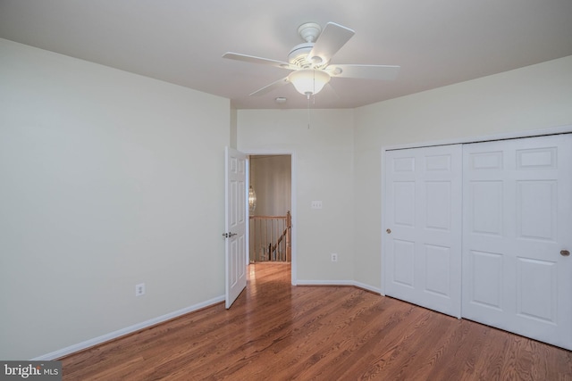 1421 Pickett Ct, Front Royal, VA 22630 - unfurnished bedroom with wood finished floors, a closet, and ceiling fan
