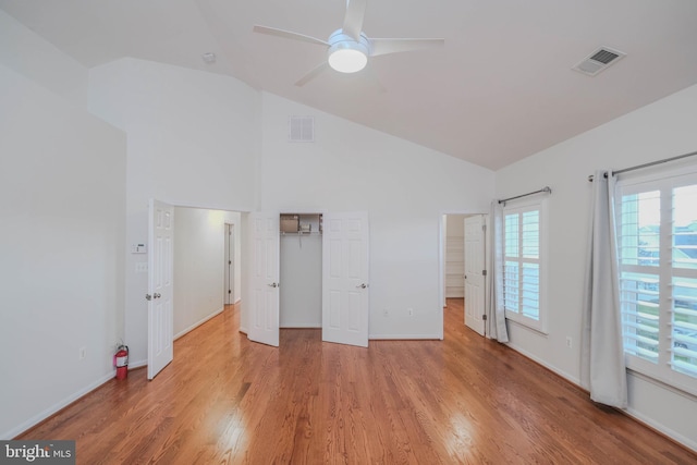 1421 Pickett Ct, Front Royal, VA 22630 - unfurnished bedroom featuring light wood-style floors, high vaulted ceiling, a ceiling fan, and a closet