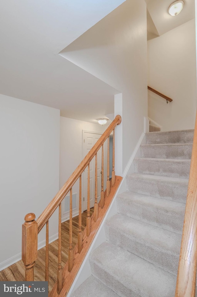 1421 Pickett Ct, Front Royal, VA 22630 - staircase featuring wood finished floors and baseboards