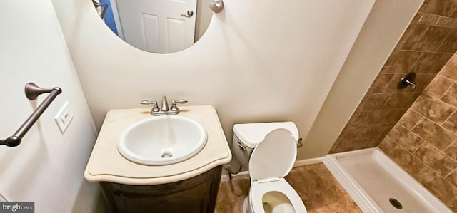 3 New Coach Ln, Willingboro, NJ 08046 - bathroom featuring tiled shower, vanity, and toilet