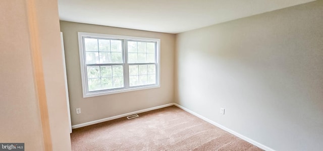 3 New Coach Ln, Willingboro, NJ 08046 - carpeted empty room with baseboards
